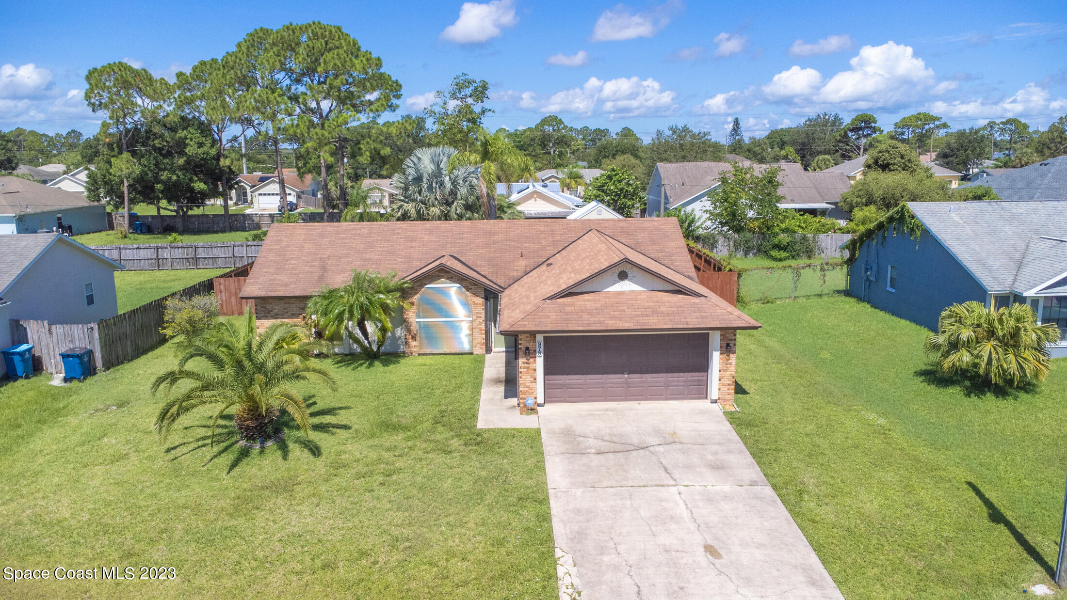 978 Locust Avenue Palm Bay, FL 32907 - Photo 32 of 41 an aerial view of a house with garden
