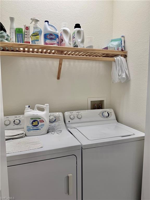 9109 Yuba Lane, Unit 80 Naples, FL 34113 - Photo 13 of 15 a utility room with dryer and washer