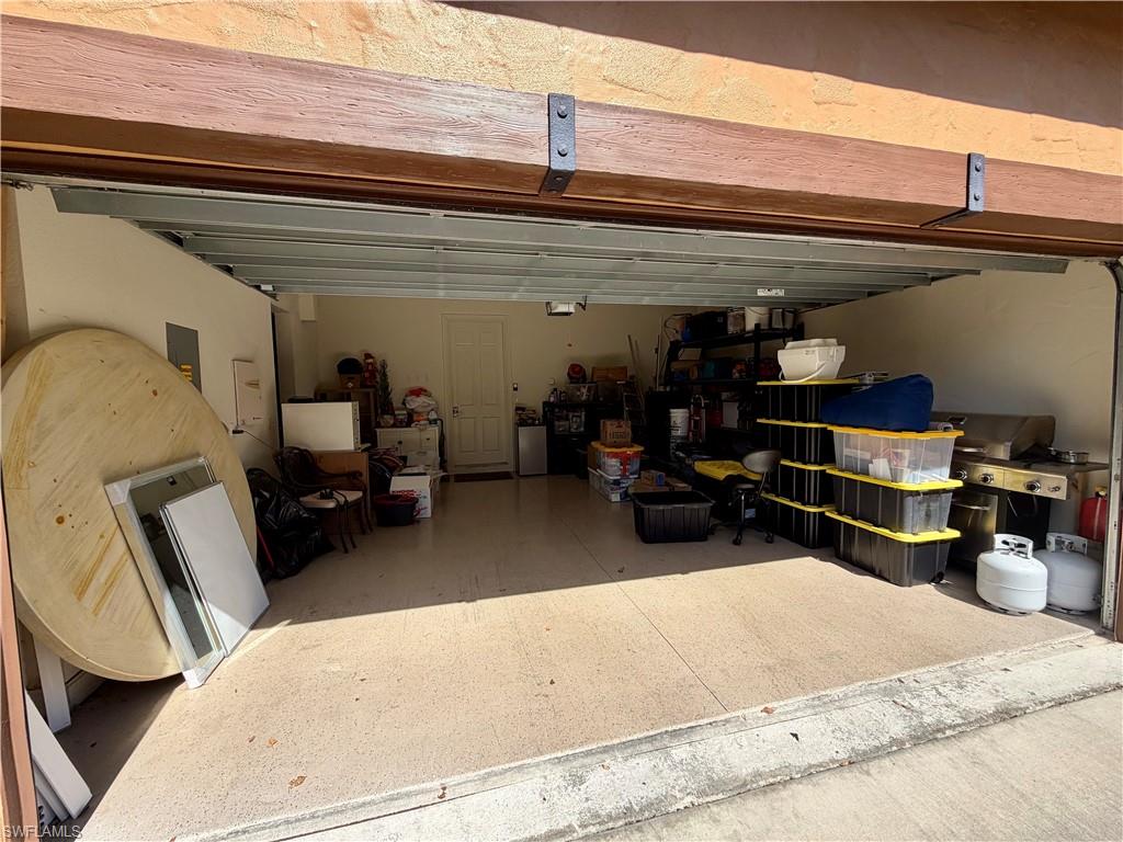 9109 Yuba Lane, Unit 80 Naples, FL 34113 - Photo 14 of 15 a view of room with gym equipment