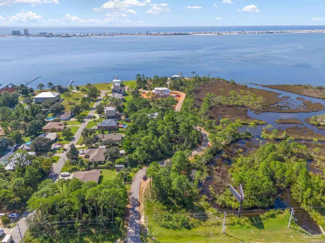 a view of a lake with a building in the background