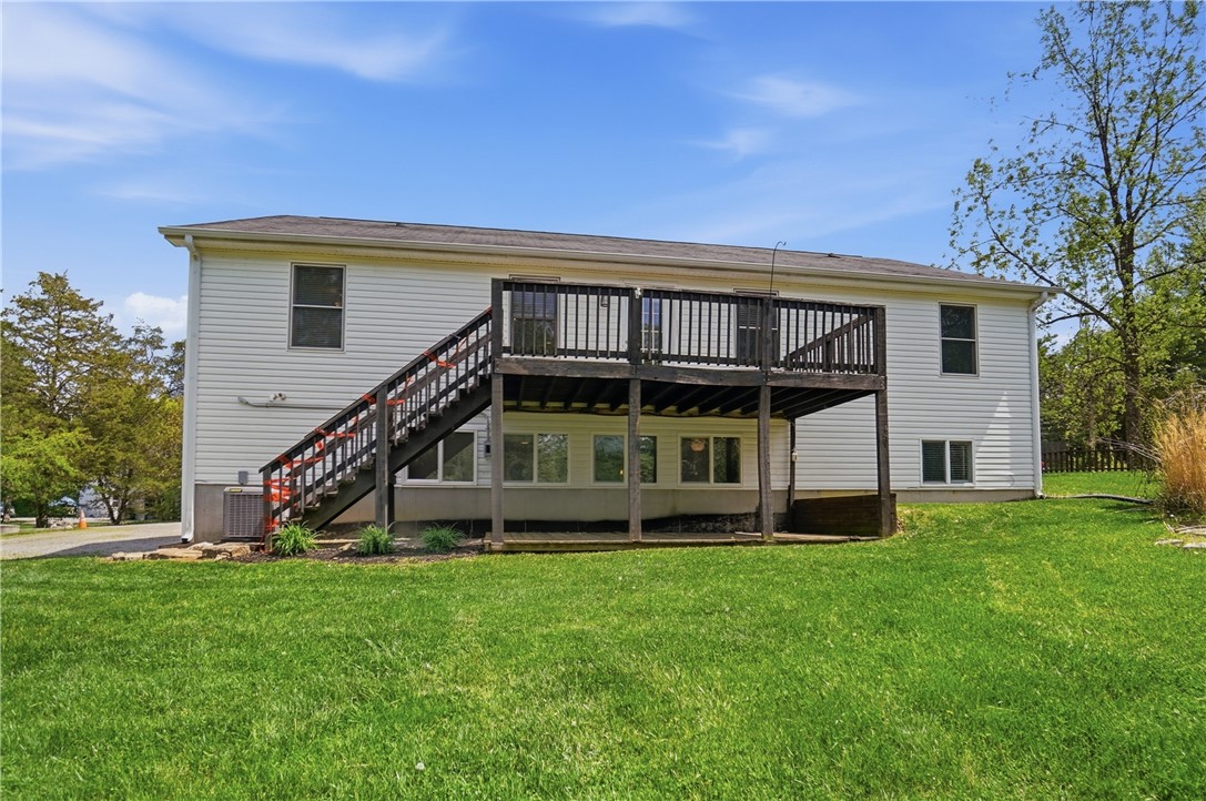 1208 Jarva Lane Springboro, OH 45066 - Photo 70 of 75 This spacious property features a durable vinyl exterior and a delightful deck for outdoor enjoyment.