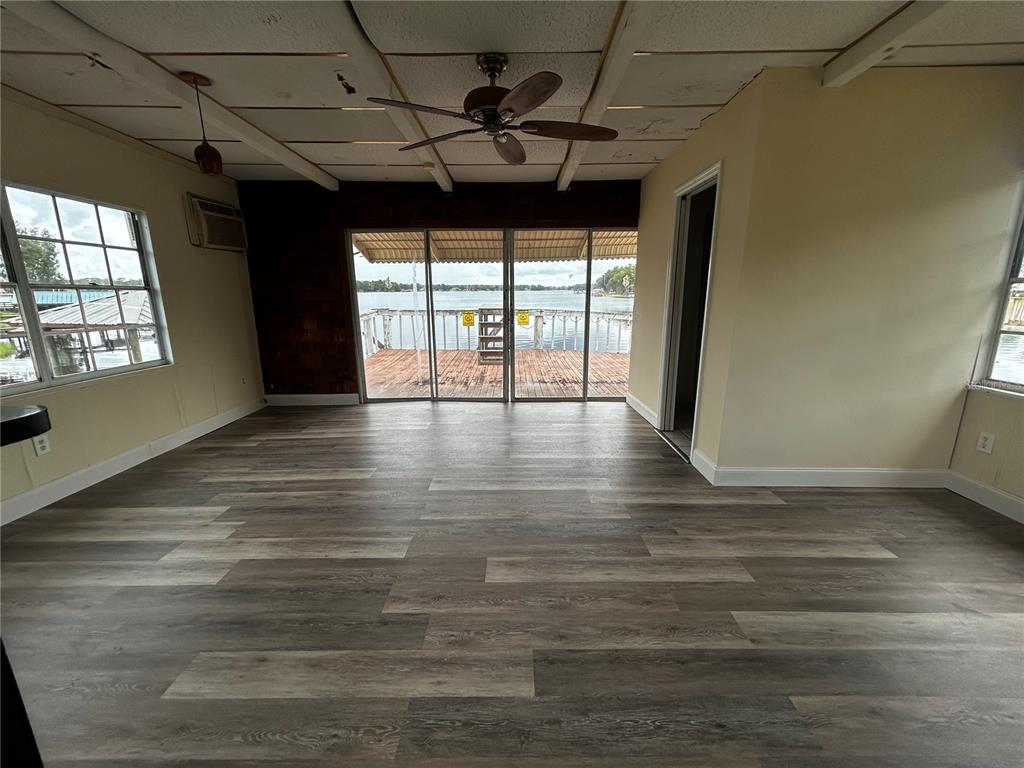 18129 Crawley Road Odessa, FL 33556 - Photo 19 of 37 a view of an empty room with a window