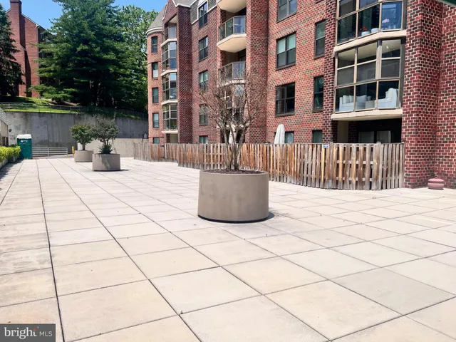a living room with furniture fireplace and a flat screen tv