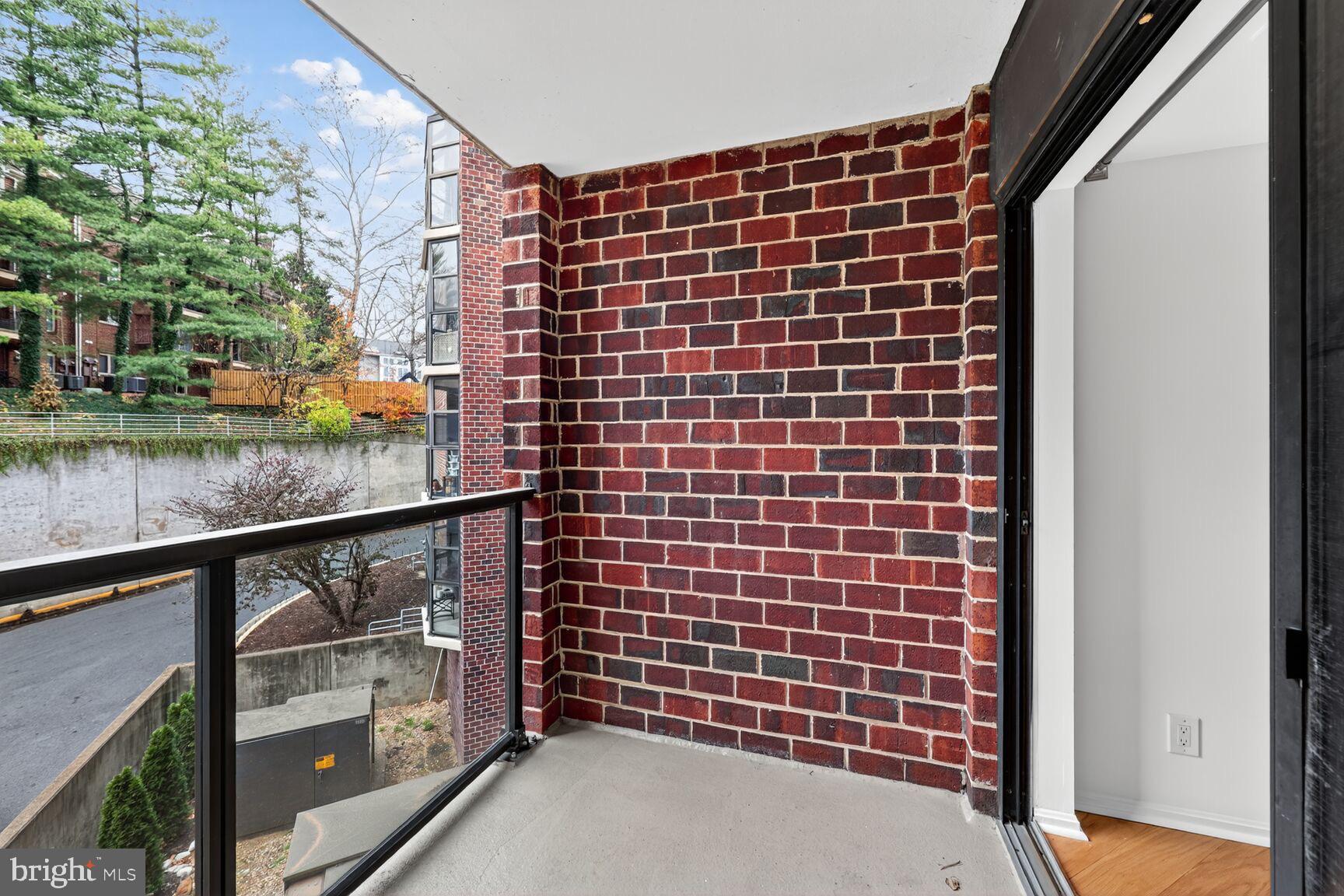 2100 Langston Boulevard, Unit 339 Arlington, VA 22201 - Photo 9 of 21 a view of balcony with wooden floor