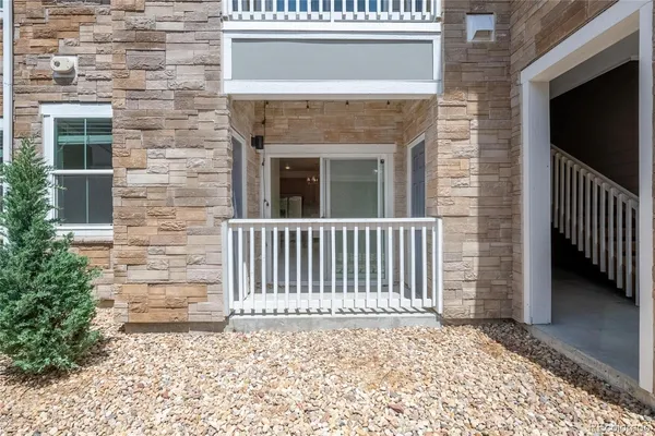 a view of a house with a bench