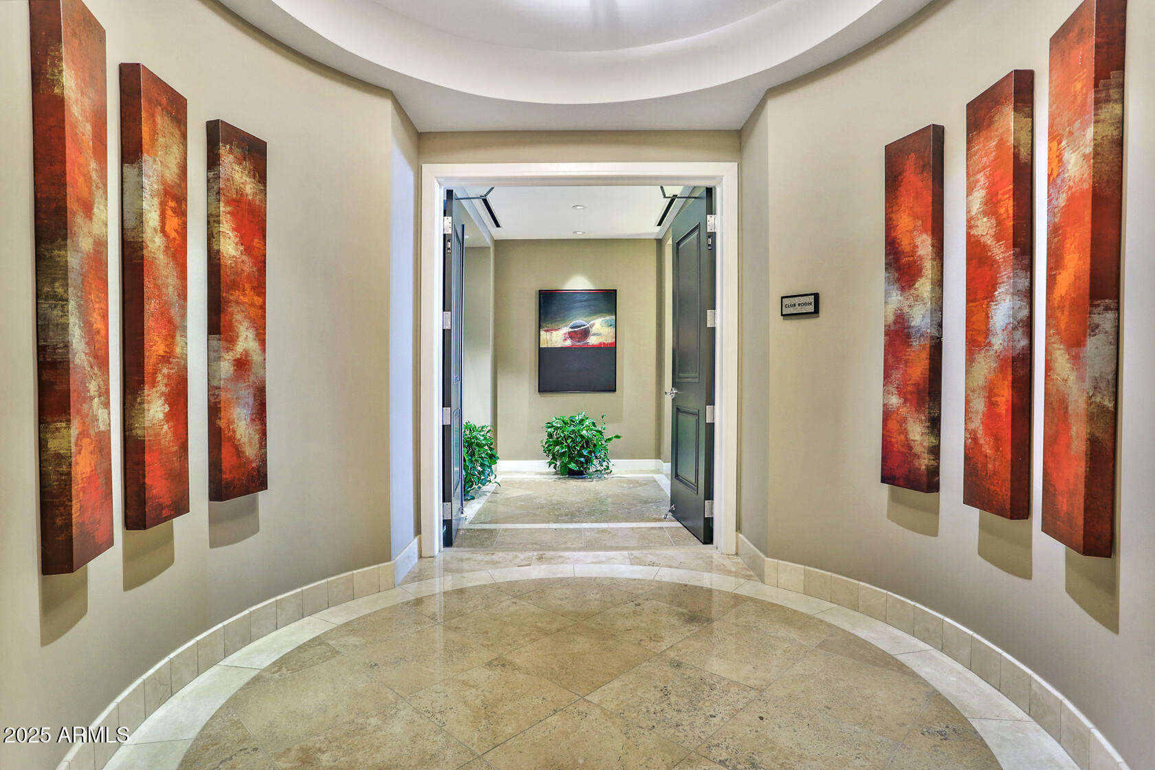 2211 East Camelback Road, Unit 506 Phoenix, AZ 85016 - Photo 5 of 10 a view of a bedroom with wooden floor and windows