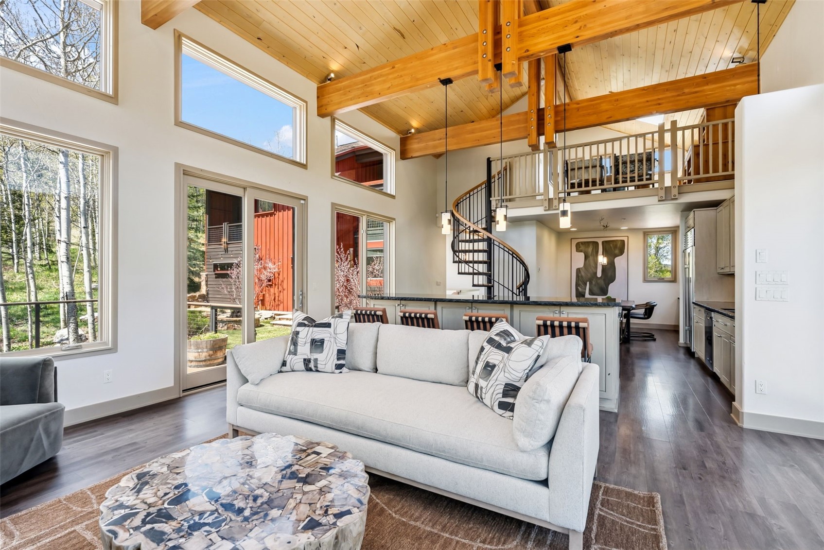 2800 Hunter's Knob Road Silverthorne, CO 80498 - Photo 8 of 37 a living room with furniture wooden floor and a table