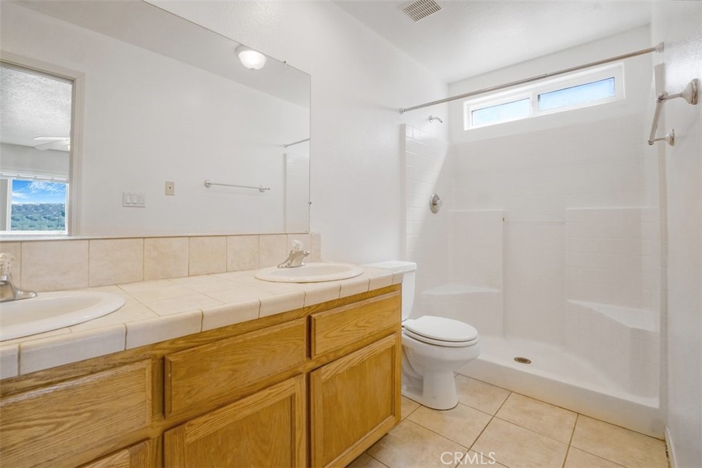 11221 Omelveny Road Oak Hills, CA 92344 - Photo 28 of 40 Master Bathroom