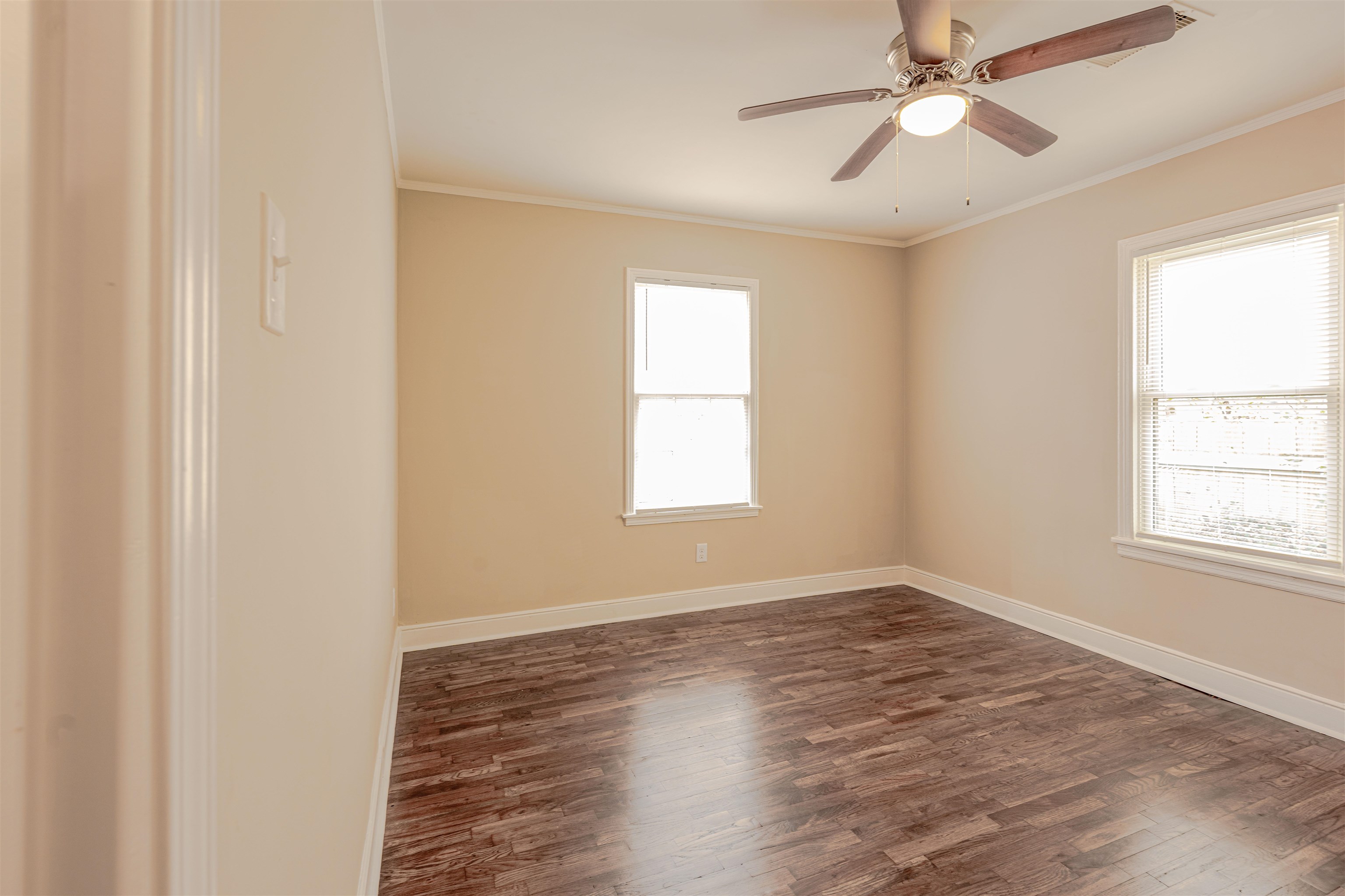 721 South Graham Street Memphis, TN 38111 - Photo 19 of 28 wooden floor in an empty room with a window