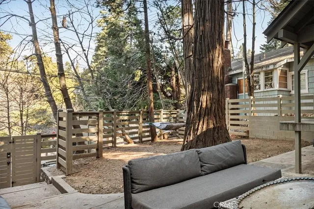 a view of living room filled with furniture and a couch