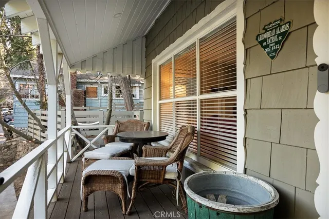 a view of a balcony and chairs