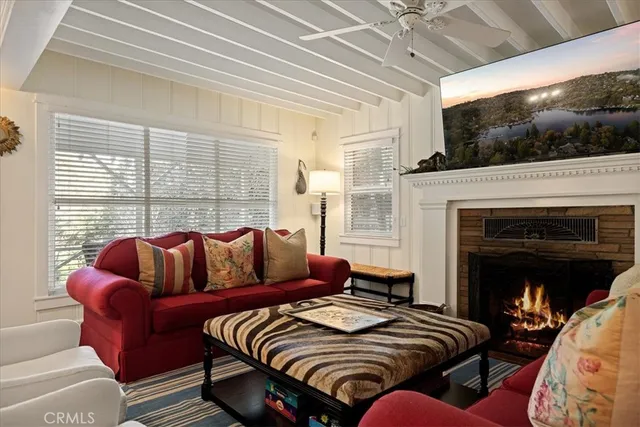 a bedroom with bed and a fireplace