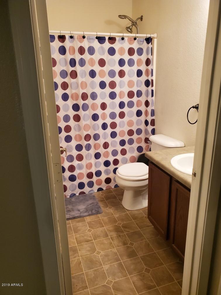 9520 West Monte Vista Road Phoenix, AZ 85037 - Photo 23 of 24 Upstairs 2nd Bath