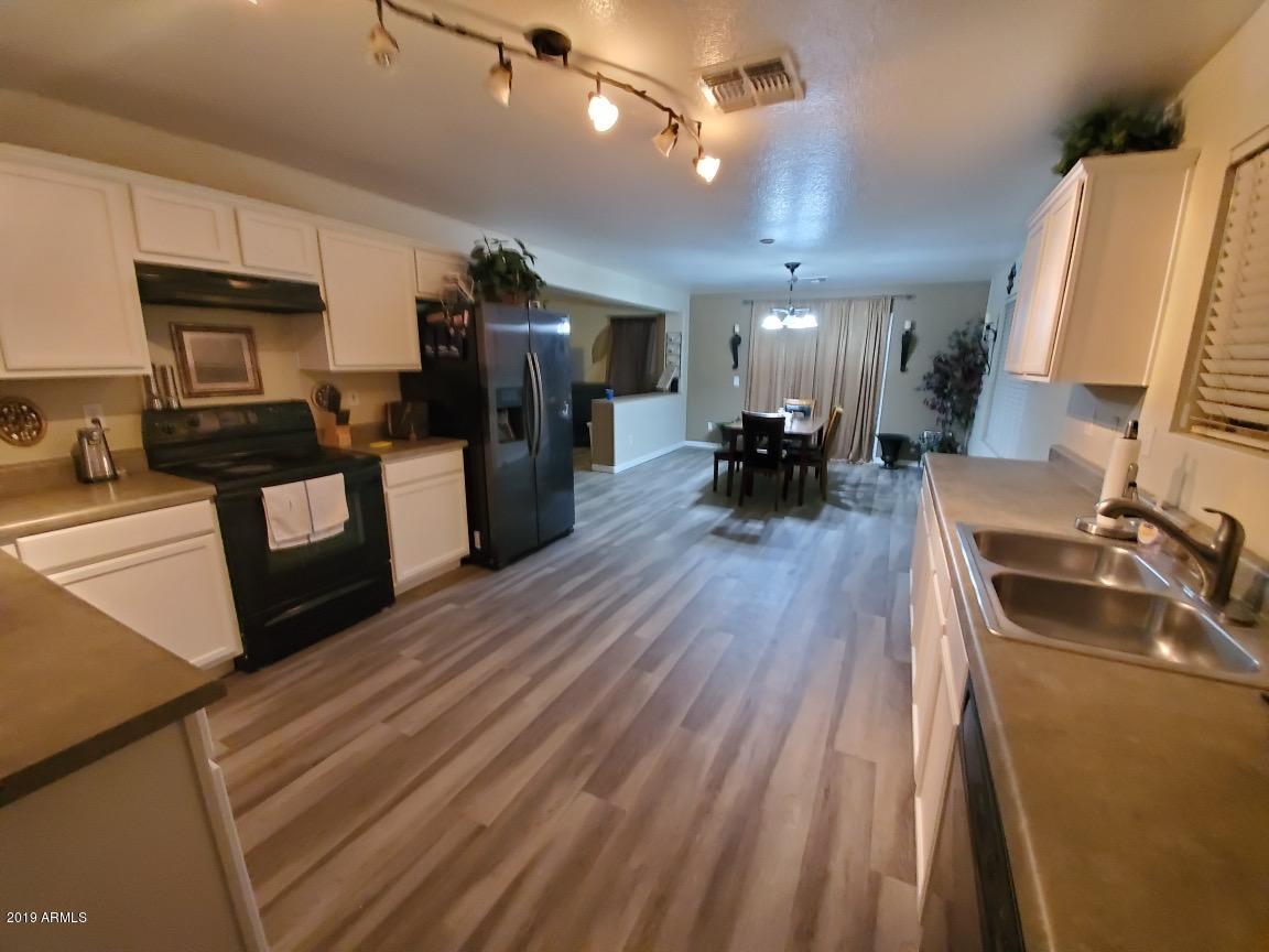 9520 West Monte Vista Road Phoenix, AZ 85037 - Photo 8 of 24 Kitchen