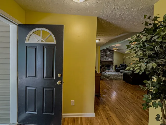 a view of living room filled with furniture
