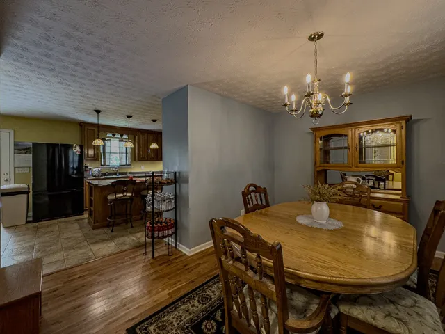 a view of a dining room with furniture