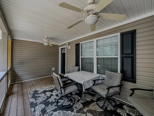 a view of a house with a yard and garage