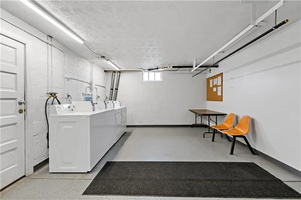 an aerial view of a city with lots of residential buildings