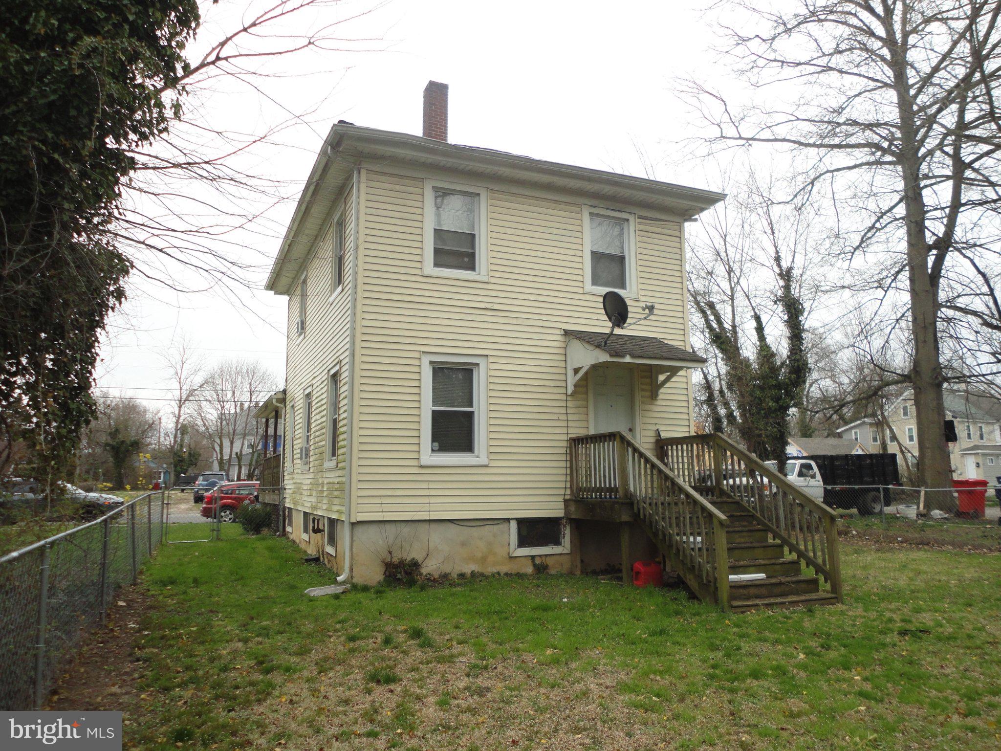 46 Ellis Street Bridgeton, NJ 08302 - Photo 7 of 8 a view of a house with a yard