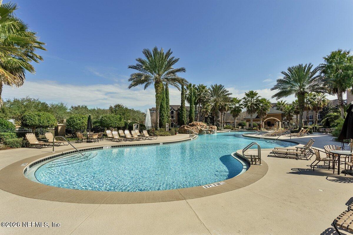 10961 Burnt Mill Road, Unit 333 Jacksonville, FL 32256 - Photo 21 of 21 a view of a swimming pool with outdoor seating