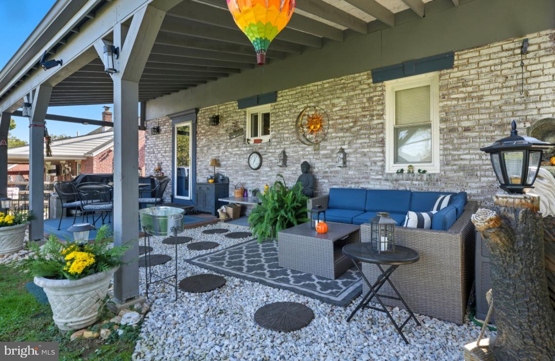 914 Thornton Road Upper Chichester, PA 19061 - Photo 21 of 29 a outdoor living space with furniture and potted plants