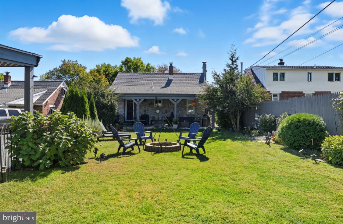 914 Thornton Road Upper Chichester, PA 19061 - Photo 26 of 29 a view of house with a yard and sitting area