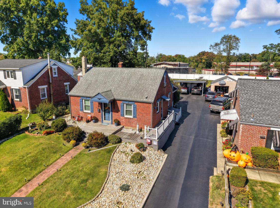 914 Thornton Road Upper Chichester, PA 19061 - Photo 27 of 29 aerial view of a house with swimming pool and furniture