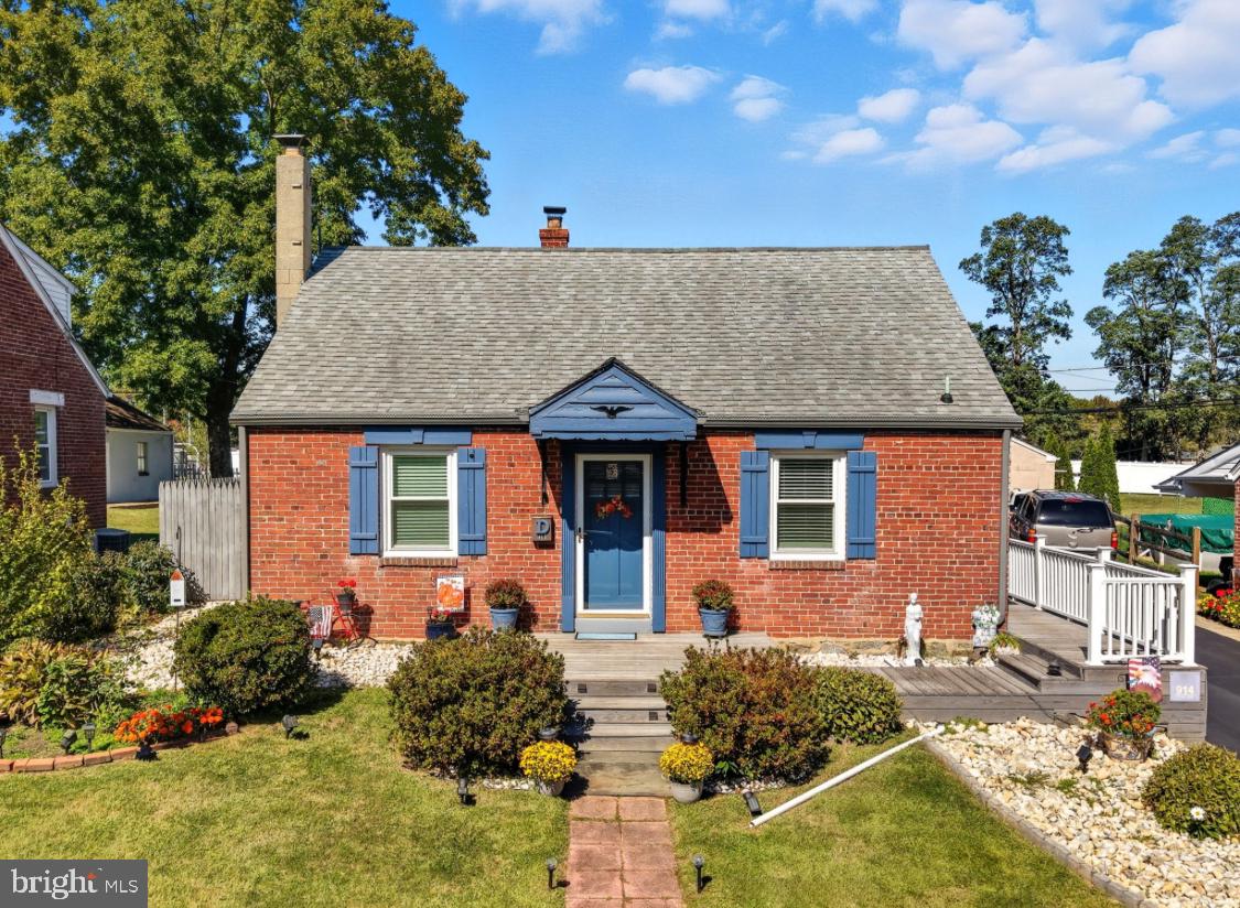 914 Thornton Road Upper Chichester, PA 19061 - Photo 29 of 29 a front view of a house with garden