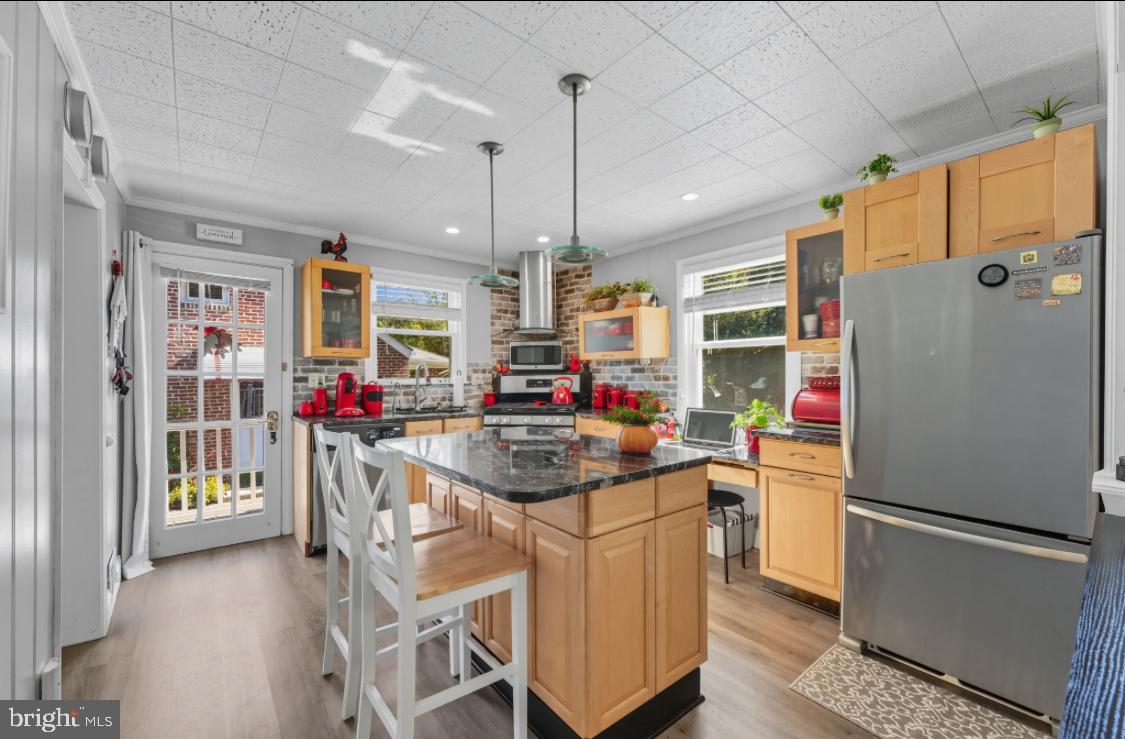 914 Thornton Road Upper Chichester, PA 19061 - Photo 4 of 29 a kitchen with refrigerator and cabinets