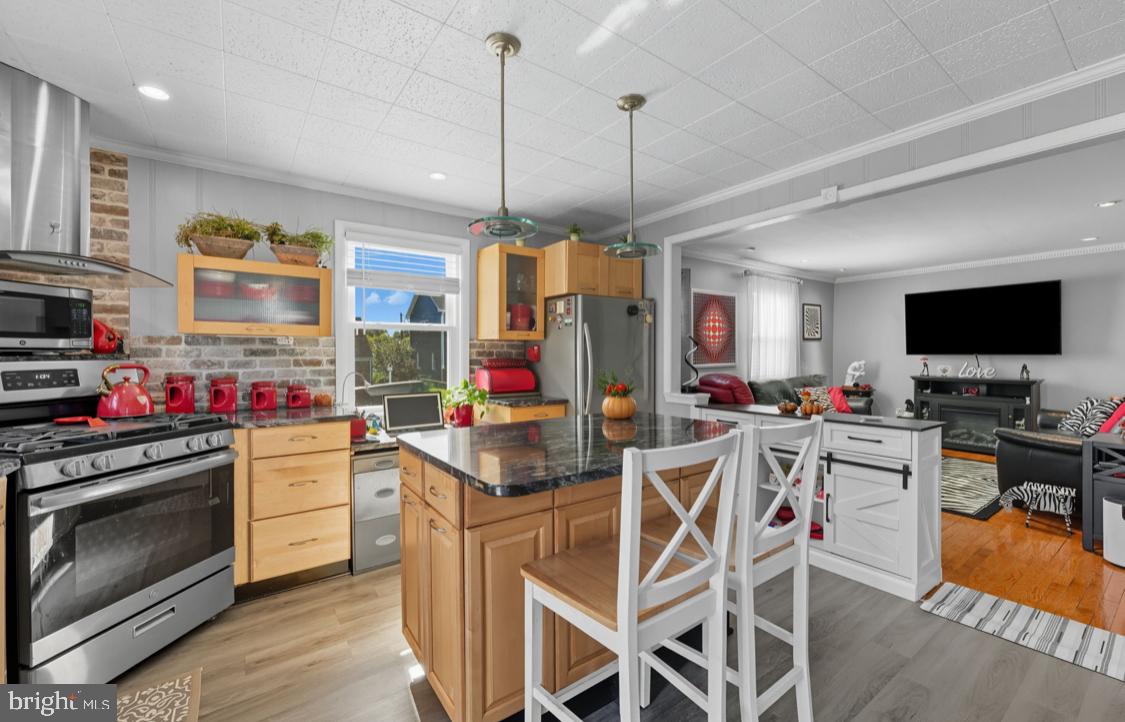 914 Thornton Road Upper Chichester, PA 19061 - Photo 5 of 29 a kitchen that has a lot of cabinets and stainless steel appliances