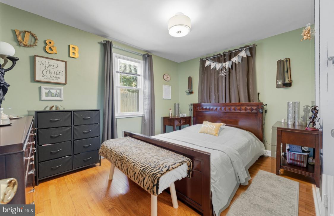 914 Thornton Road Upper Chichester, PA 19061 - Photo 9 of 29 a bedroom with a bed and furniture