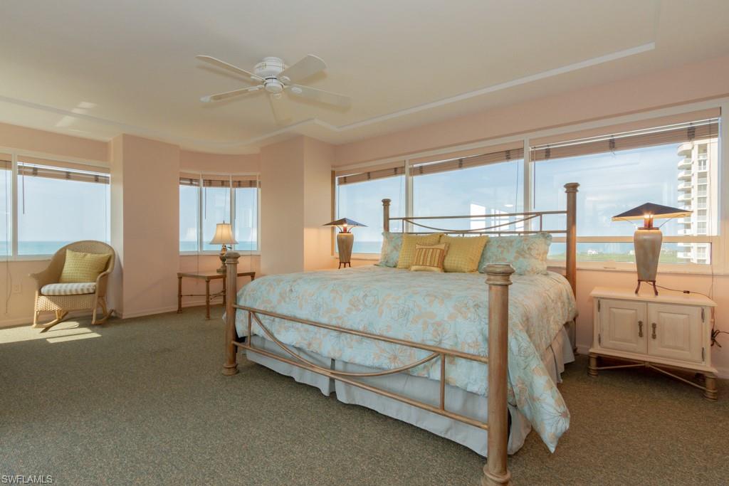 6825 Grenadier Boulevard, Unit 1505 Naples, FL 34108 - Photo 15 of 35 a bedroom with a bed and window