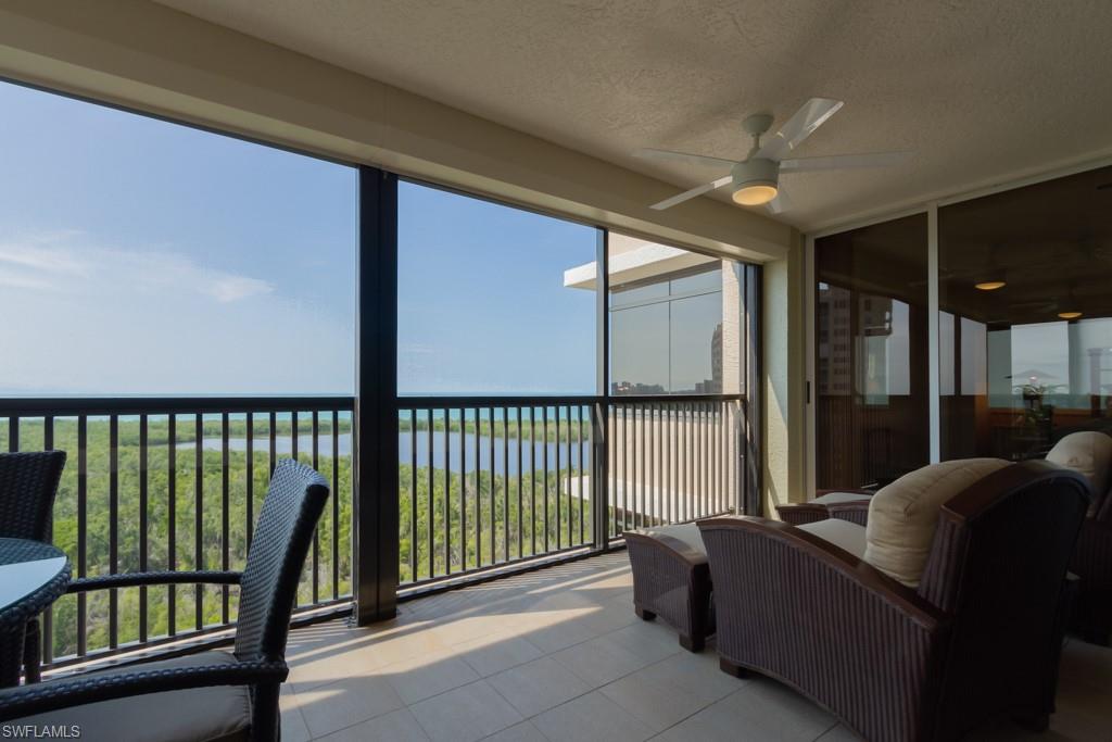 6825 Grenadier Boulevard, Unit 1505 Naples, FL 34108 - Photo 30 of 35 a living room with furniture