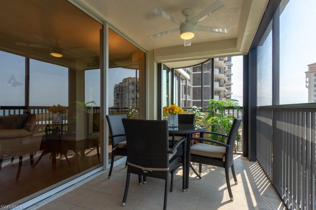 6825 Grenadier Boulevard, Unit 1505 Naples, FL 34108 - Photo 33 of 35 a view of a dining room with furniture window and outside view