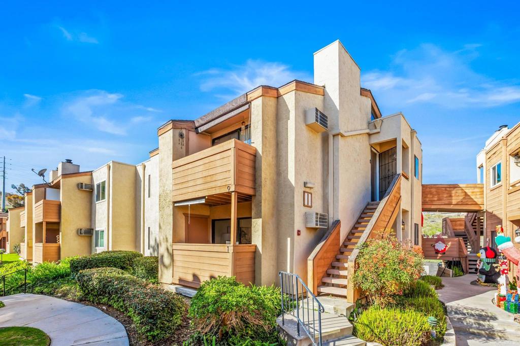 2920 Briarwood Road, Unit I1 Bonita, CA 91902 - Photo 20 of 24 a view of a building with a yard