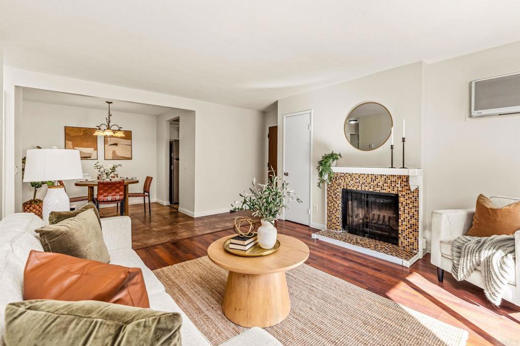 2920 Briarwood Road, Unit I1 Bonita, CA 91902 - Photo 3 of 24 a living room with furniture and a fireplace