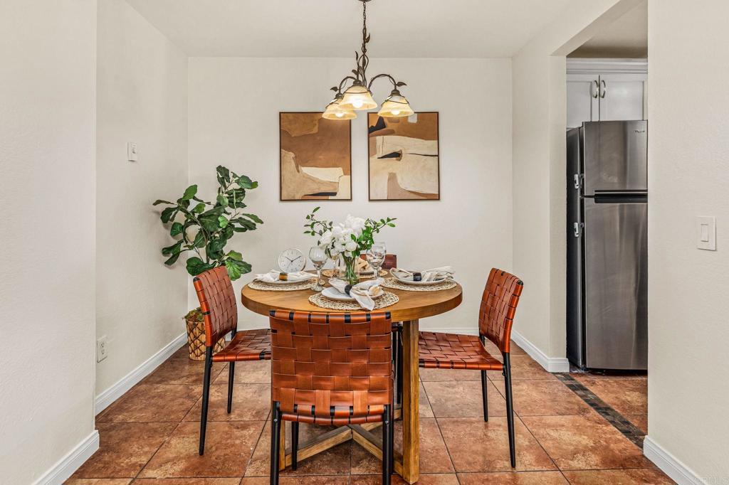 2920 Briarwood Road, Unit I1 Bonita, CA 91902 - Photo 4 of 24 a dining room with furniture and window