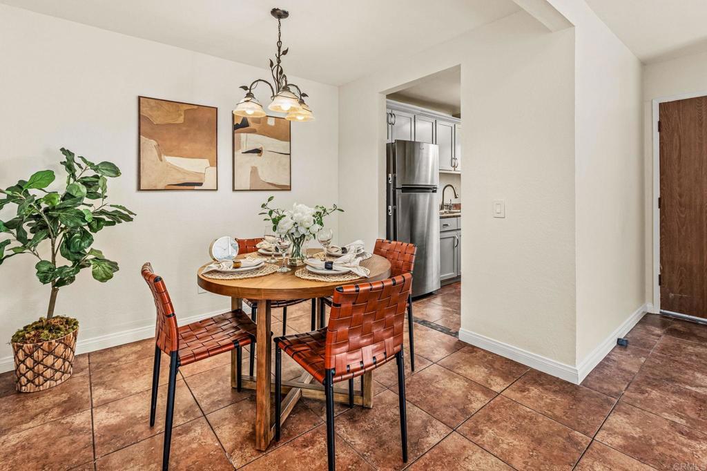 2920 Briarwood Road, Unit I1 Bonita, CA 91902 - Photo 5 of 24 a dining room with furniture and window