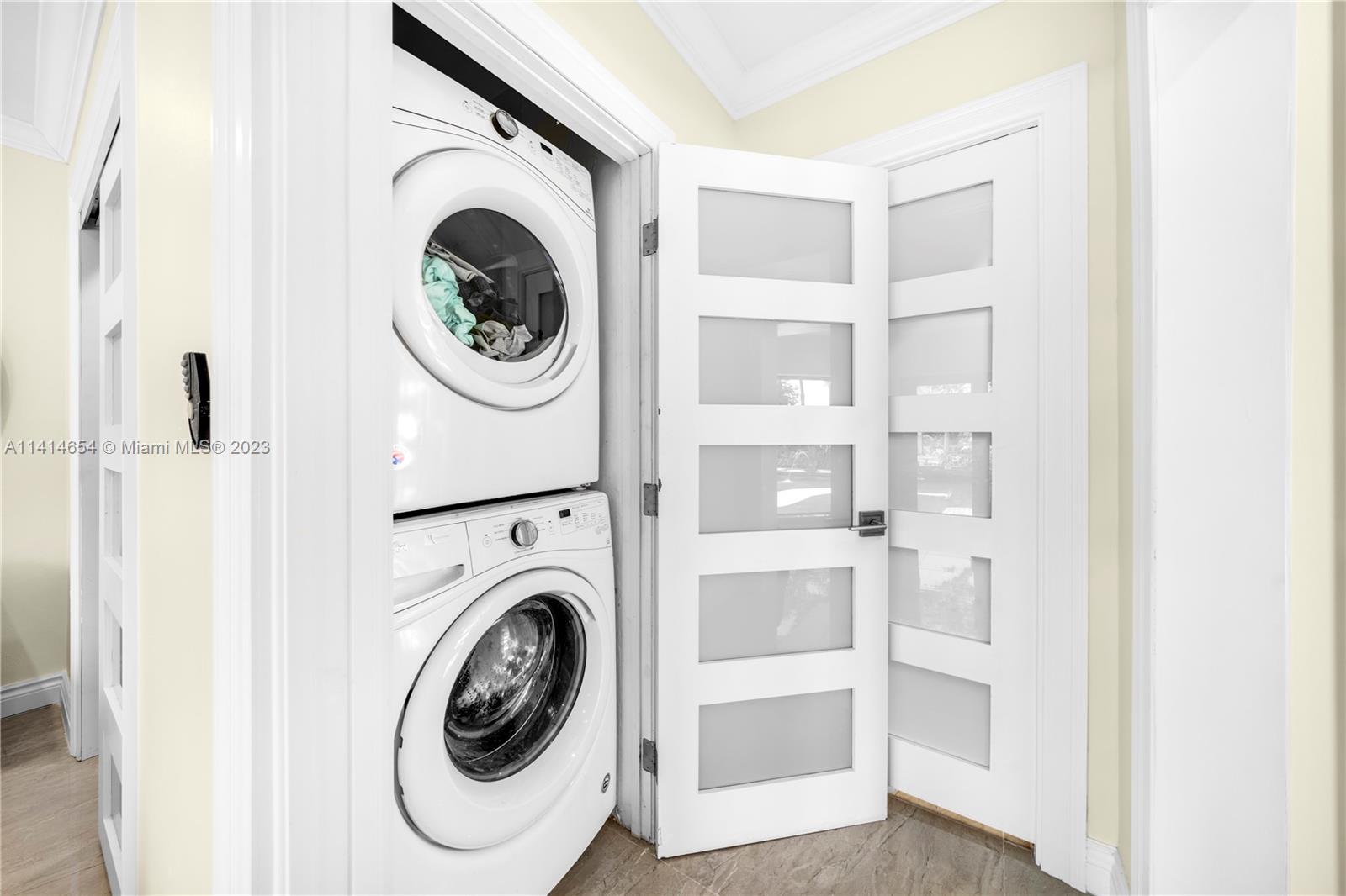 1160 Northeast 91st Street Miami, FL 33138 - Photo 16 of 33 a utility room with dryer and washer