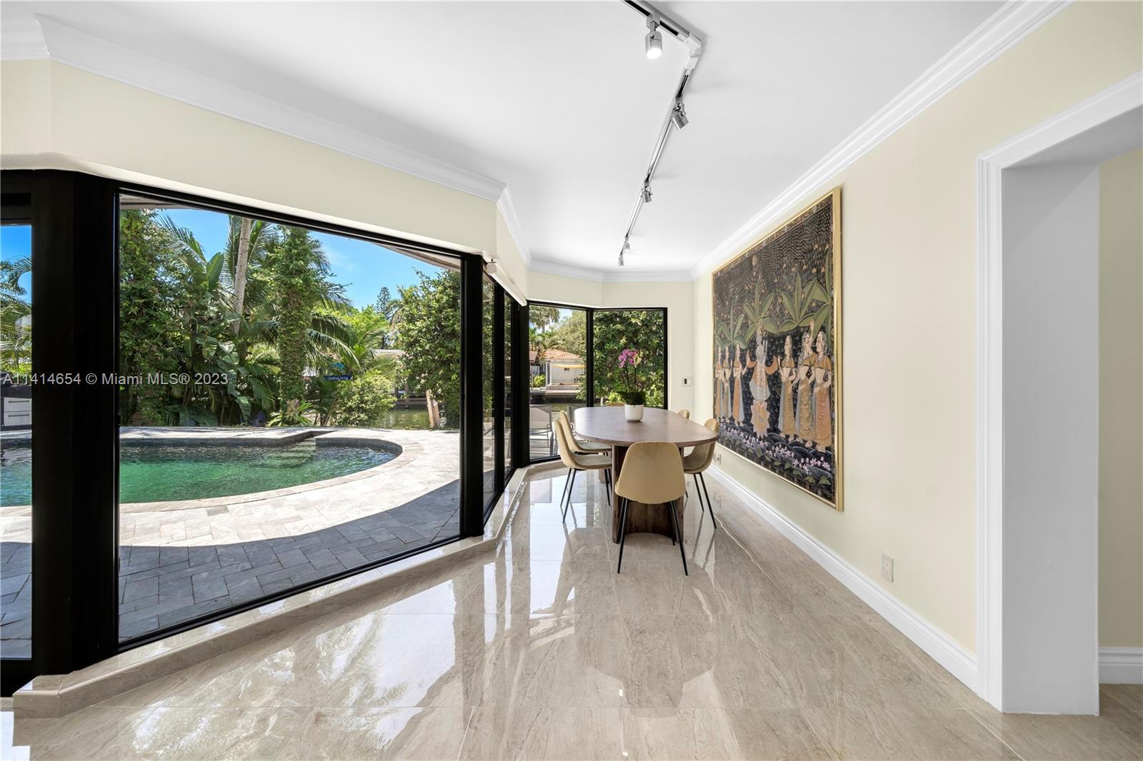 1160 Northeast 91st Street Miami, FL 33138 - Photo 6 of 33 a very nice looking room with a large window