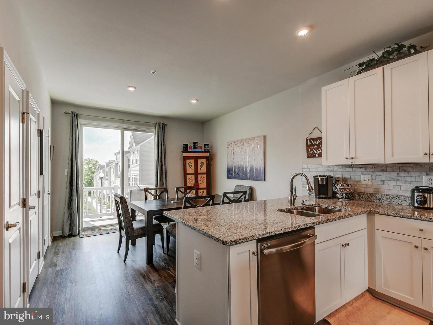 7511 Mundell Road Hanover, MD 21076 - Photo 10 of 26 Kitchen to Dining