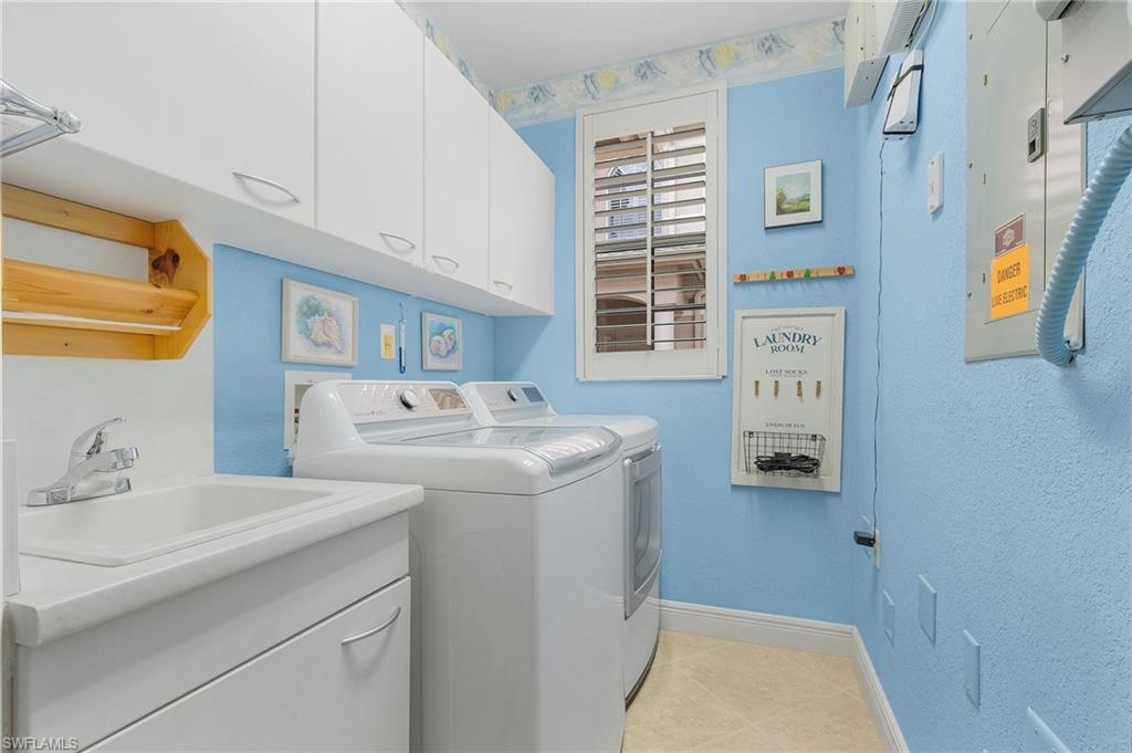 801 Regency Reserve Circle, Unit 4301 Naples, FL 34119 - Photo 18 of 26 a bathroom with a sink a toilet and shower