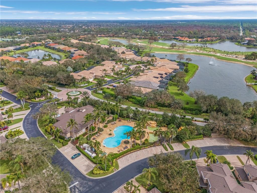 801 Regency Reserve Circle, Unit 4301 Naples, FL 34119 - Photo 23 of 26 an aerial view of ocean and residential houses with outdoor space