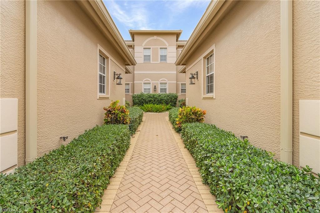 801 Regency Reserve Circle, Unit 4301 Naples, FL 34119 - Photo 25 of 26 a view of a back yard