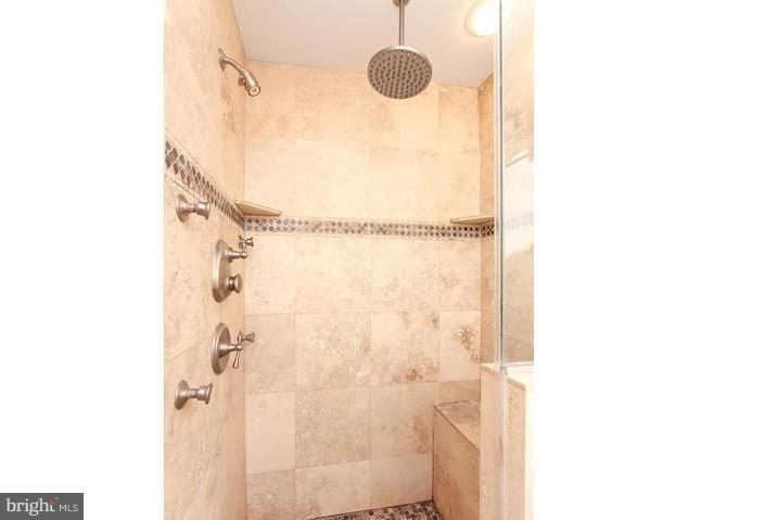 3403 Dillon Street Baltimore, MD 21224 - Photo 14 of 30 a bathroom with a shower