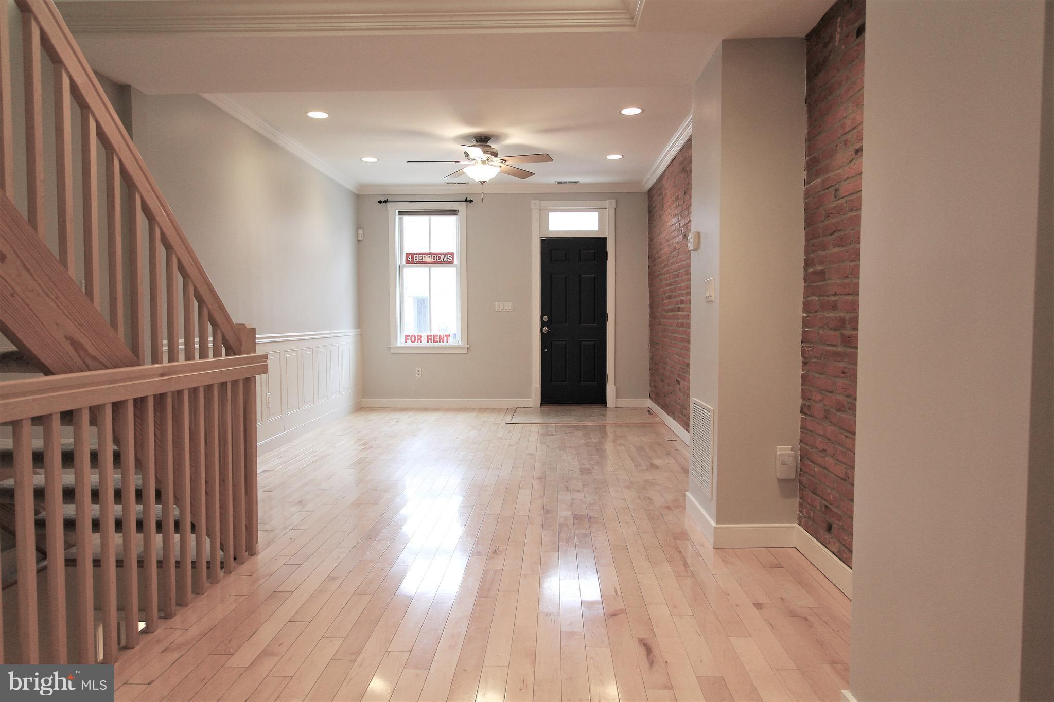 3403 Dillon Street Baltimore, MD 21224 - Photo 7 of 30 a view of gallery with wooden floor