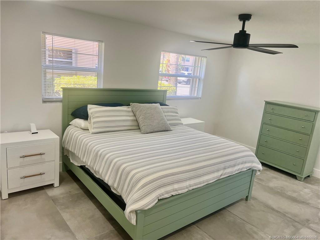 2600 South Kanner Highway, Unit D6 Stuart, FL 34994 - Photo 13 of 25 a bedroom with a bed and a window