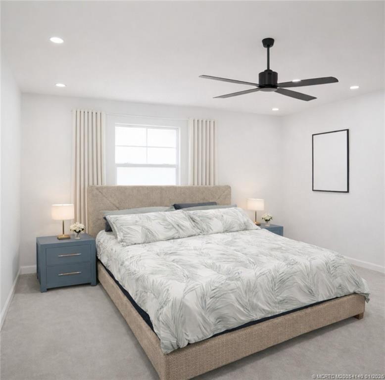 2600 South Kanner Highway, Unit D6 Stuart, FL 34994 - Photo 20 of 25 a bedroom with a bed and window