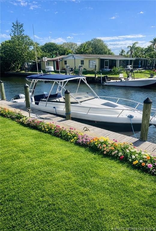 2600 South Kanner Highway, Unit D6 Stuart, FL 34994 - Photo 25 of 25 a front view of a house with garden
