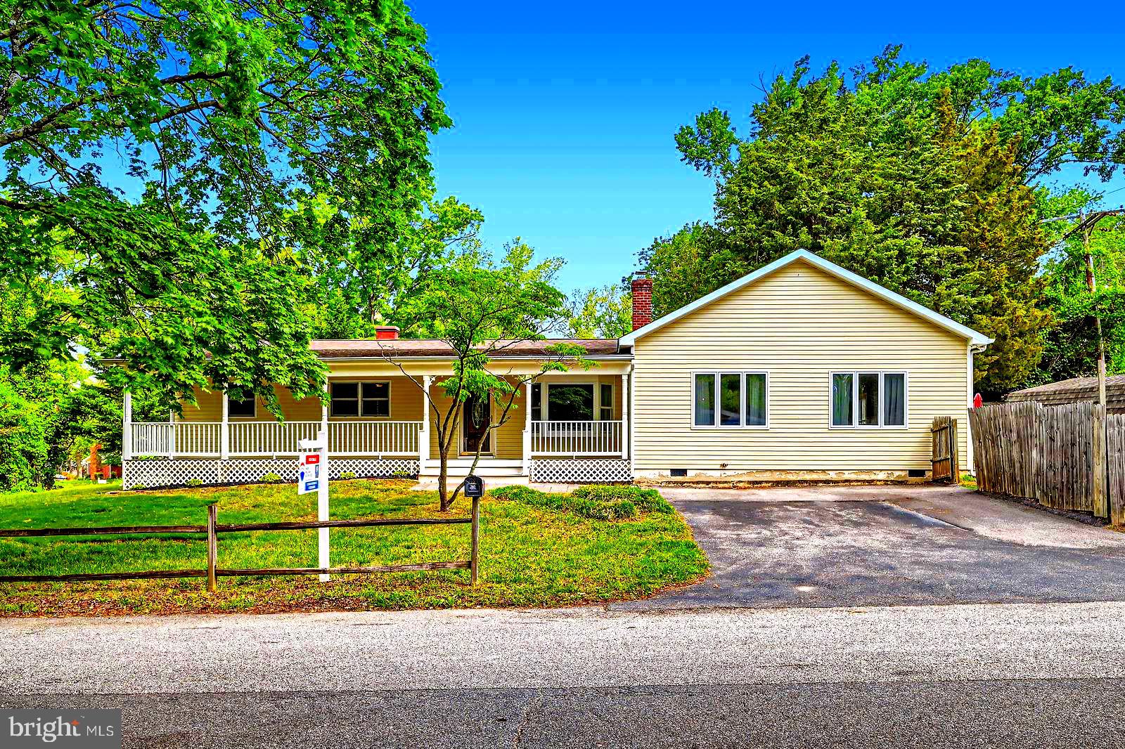 302 Haskell Drive Arnold, MD 21012 - Photo 2 of 31 a front view of house with garage and green space